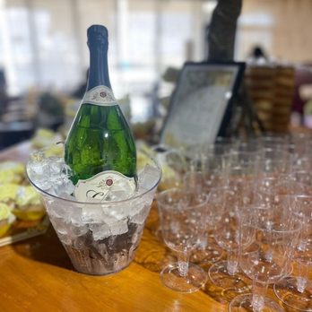 Todo Natural - a bottle of champagne and glasses - Mexican Near Me - Brownsville, Texas