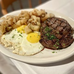 The Barn Door - Steak and eggs brunch special. Also comes with unlimited biscuits and dinner rolls. Great value!