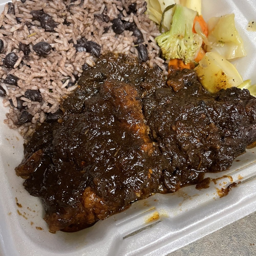 Jamaican Jerk Machine - Ox tails - Caribbean Near Me Jamaican Jerk Machine - Ox tails - Caribbean Near Me