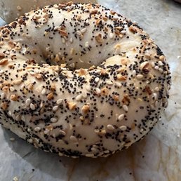 a bagel covered in sesame seeds