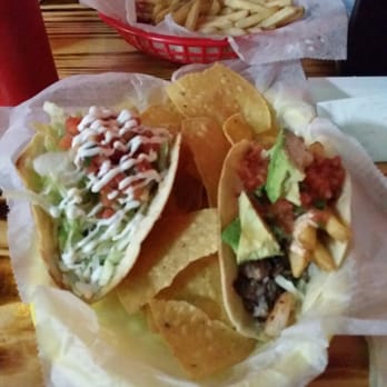 Jimmy Hula's - Malibu Fish taco on the left, Shrimp  (Wipeout) taco on the right @ Jimmy Hula's in Altamonte Springs - Hawaiian Near Me - Altamonte Springs, Florida
