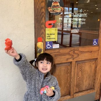 Sizzler - Waiting for her fav restaurant to open. - Seafood Near Me - Colma, California Sizzler - Waiting for her fav restaurant to open. - Seafood Near Me - Colma, California