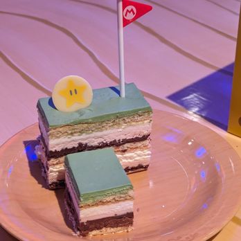 Toadstool Cafe - Mt. Bean Pole Cake, $9.99 prior to tax - Cafes Near Me - Universal City, California Toadstool Cafe - Mt. Bean Pole Cake, $9.99 prior to tax - Cafes Near Me - Universal City, California