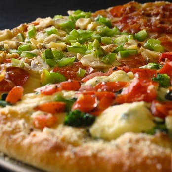 Nia's Pizzeria - a pizza with various toppings - Italian Near Me - Oley, Pennsylvania Nia's Pizzeria - a pizza with various toppings - Italian Near Me - Oley, Pennsylvania