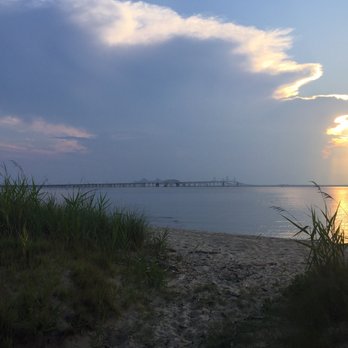 Terrapin Nature Park - A view of the Bay Bridge nearing sunset and bug feeding time. - Parks Near Me - Stevensville, Maryland