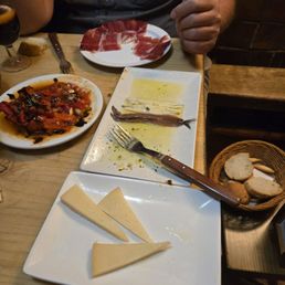 Cheese, salad of tomatoes and peppers, ham, marinated anchovies. Cheese, salad of tomatoes and peppers, ham, marinated anchovies.