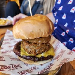 Burgers and Beers Grillhouse - My husband's burger with a haggis patty inside with the beef, cheese, and onion rings.