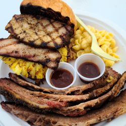 Rollin’ Bones - Pineapple express sandwich. Pork belly, pulled pork and grilled pineapple with a side of brisket and some mac and cheese. Legendary.