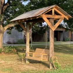 Triple T Farm Wedding and Event Venue - One of 4 swings on the property. Century old barn in background.