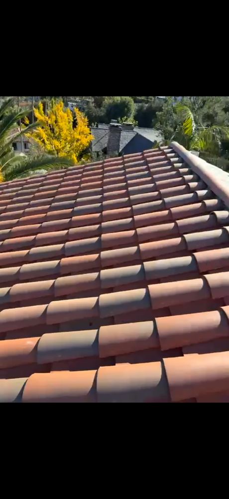 Slide of Husky Roofing