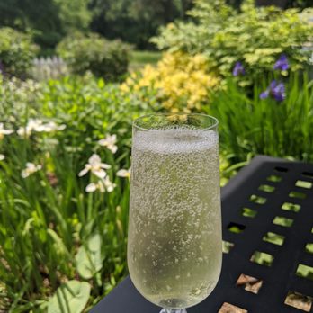 Monet's Table - Prosecco with the garden backdrop - New American Near Me - Tolland, Connecticut Monet's Table - Prosecco with the garden backdrop - New American Near Me - Tolland, Connecticut