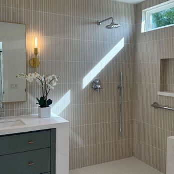 Los Pinos Cabinets - a bathroom with a sink and shower - Cabinetry Near Me