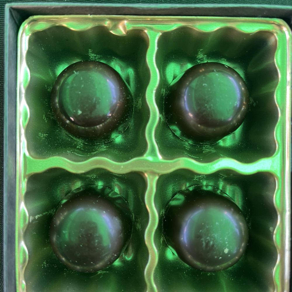 Stone Grindz Chocolate - four chocolates in a green box - Chocolatiers & Shops Near Me - Scottsdale, Arizona