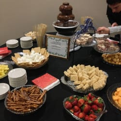 Village of Round Lake Beach Cultural & Civic Center - Dessert table of chocolate fountain and dipable items at Holiday Wine Tasting & Radio Play 2013