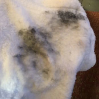 Holiday Inn Express & Suites Brookhaven - Dirt from the remote AFTER trying to clean it with a Clorox wipe. - Hotels Near Me - Brookhaven, Mississippi