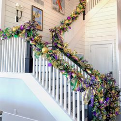 Custom Mardi Gras staircase garland for a Houston home. Arcadia creates seasonal décor for every holiday, not just Christmas.