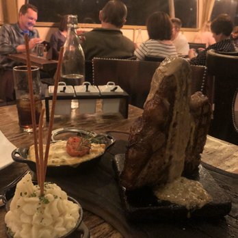 Barbacoa Grill - Two and a half pound porterhouse with mashed potatoes and Four Cheese Ham Mac & Cheese - Steakhouses Near Me - Boise, Idaho