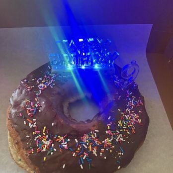 Sunrise Donuts - Celebration donut that we added light up candles to - Donuts Near Me - Phoenix, Arizona