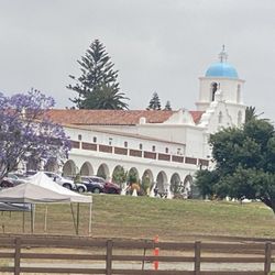Hacienda Mission San Luis Rey by Watermark - View of Mission San Luis Rey from the patio of the Hacienda.