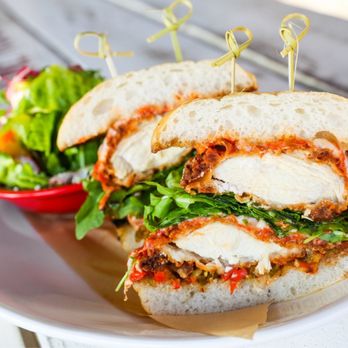 Cane Rosso - a chicken sandwich with lettuce and tomato sauce - Pizza Near Me - Dallas, Texas Cane Rosso - a chicken sandwich with lettuce and tomato sauce - Pizza Near Me - Dallas, Texas