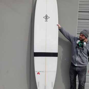 Toney Surfboard Repair - Board is in one piece. The black band covers where it was broken in half. Amazing! - Surf Shop Near Me - Westminster, California Toney Surfboard Repair - Board is in one piece. The black band covers where it was broken in half. Amazing! - Surf Shop Near Me - Westminster, California