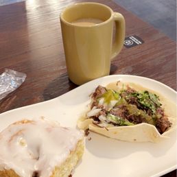 Cinnamon roll and coffee Cinnamon roll and coffee