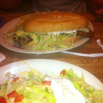 Rancho Grande Grill - a plate of salad and a sandwich - Mexican Near Me - Opp, Alabama