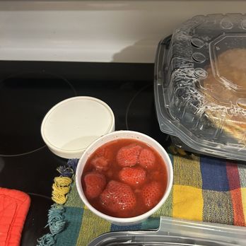 Poodle Dog - Strawberries for topping and pancakes in the distance - Breakfast & Brunch Near Me - Fife, Washington