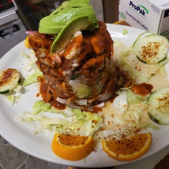 El pariente - a plate of food on a table - Mexican Near Me - Postville, Iowa El pariente - a plate of food on a table - Mexican Near Me - Postville, Iowa