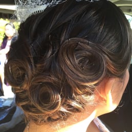 Hair styled by Camila R. Hair styled by Camila R.