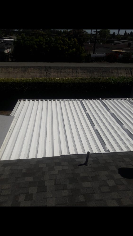 Slide of Barnett Roofing