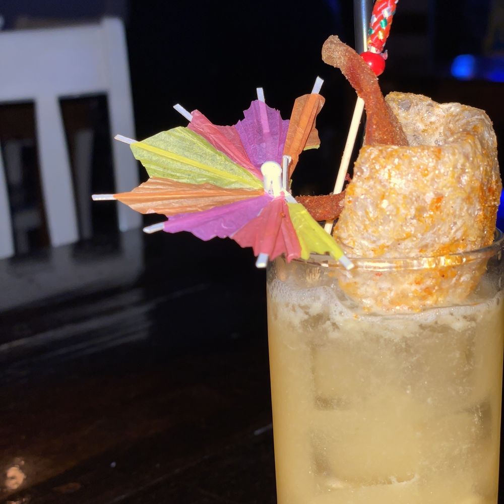 Ladybird's - Feathered Lady - Cocktail Bars Near Me - Houston, Texas Ladybird's - Feathered Lady - Cocktail Bars Near Me - Houston, Texas
