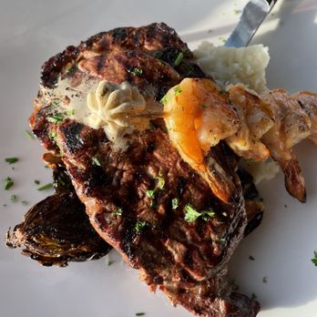 Tidal Raves - The ribeye with Brussels mashed potatoes and shrimp - New American Near Me - Depoe Bay, Oregon