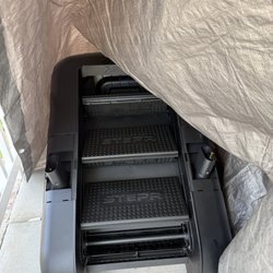 The STEPR on our front porch which we had to cover as it was raining cats & dogs.
