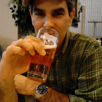 Budweiser Brewery Experience - Hubby enjoying a beer after our tour in St Loius - Beer Tours Near Me - Saint Louis, Missouri