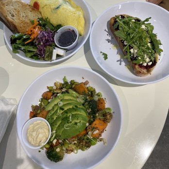 Nic & Luc - Spinach feta omelet, berries and feta toast, and super green bowl with avocado and garlic aoli. - New American Near Me - Orlando, Florida Nic & Luc - Spinach feta omelet, berries and feta toast, and super green bowl with avocado and garlic aoli. - New American Near Me - Orlando, Florida