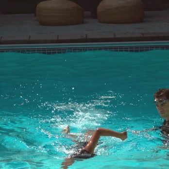 Swim Lessons Vancouver - Founder and head instructor Diogo analyzing his student's front crawl for corrections. - Swimming Lessons/Schools Near Me Swim Lessons Vancouver - Founder and head instructor Diogo analyzing his student's front crawl for corrections. - Swimming Lessons/Schools Near Me