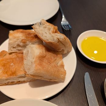 Leon's - house bread and olive oil - Italian Near Me - New York, New York