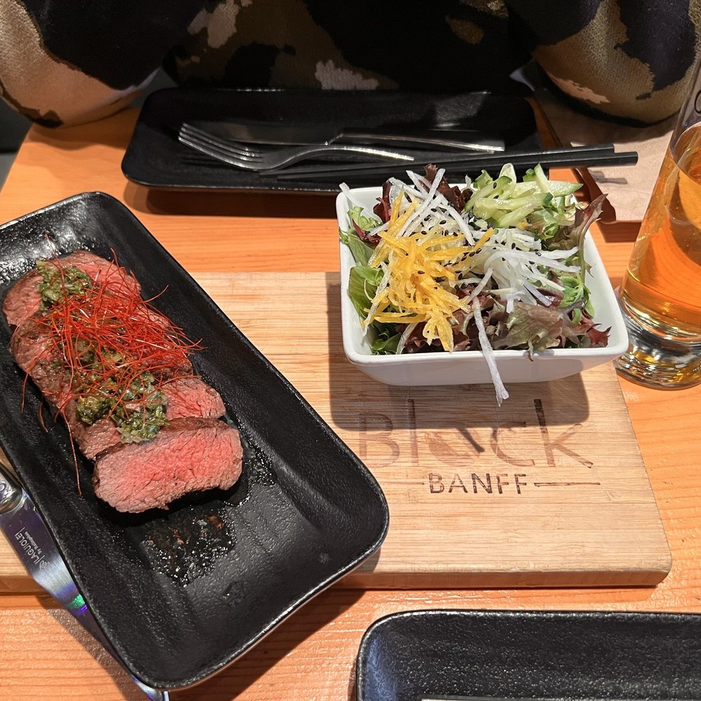 Block Kitchen + Bar - Bison steak with salad - Sandwiches Near Me - Banff, Alberta Block Kitchen + Bar - Bison steak with salad - Sandwiches Near Me - Banff, Alberta