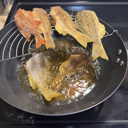 Crispy fried snapper and menpachi. Crispy fried snapper and menpachi.
