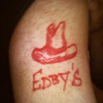 Arby's - a red hat on a man's arm - Fast Food Near Me - Charleston, Illinois