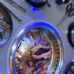 KPOT Korean BBQ & Hot Pot - BBQ cooking - pork belly and ribeye