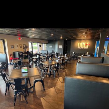 Deli-ish - tables and chairs in a restaurant - Delis Near Me - Milford Mill, Maryland Deli-ish - tables and chairs in a restaurant - Delis Near Me - Milford Mill, Maryland