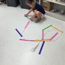 When this camper couldn't find the tape measure, she improvised!