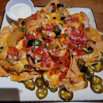 Tommy's Tavern + Tap - Loaded nachos with chicken - American Near Me - Edison, New Jersey Tommy's Tavern + Tap - Loaded nachos with chicken - American Near Me - Edison, New Jersey