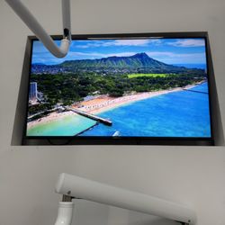 Bixby Hill Dental - Watch TV during your procedure, relaxing!