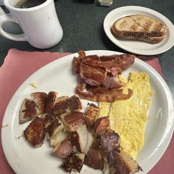 Old Croydon Cafe - Two Scrambled eggs, bacon, home fries and rye toast with coffee.... Good breakfast $14 and change
