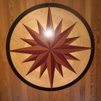 MP Hardwood Flooring - a wood floor with a starburst - Flooring Near Me MP Hardwood Flooring - a wood floor with a starburst - Flooring Near Me