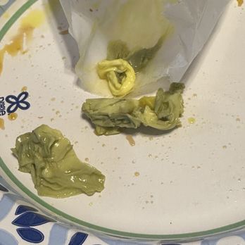 Golden Dragon - From egg drop soup. Not sure why these parts of the egg are dark. Didn't eat that part. - Sushi Bars Near Me - Midwest City, Oklahoma