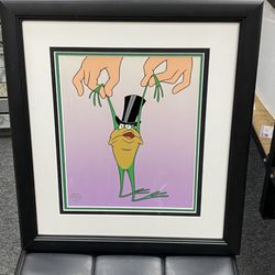 Holmes Custom Picture Framing - Michigan J. Frog , framed to Disney level cell conservation.